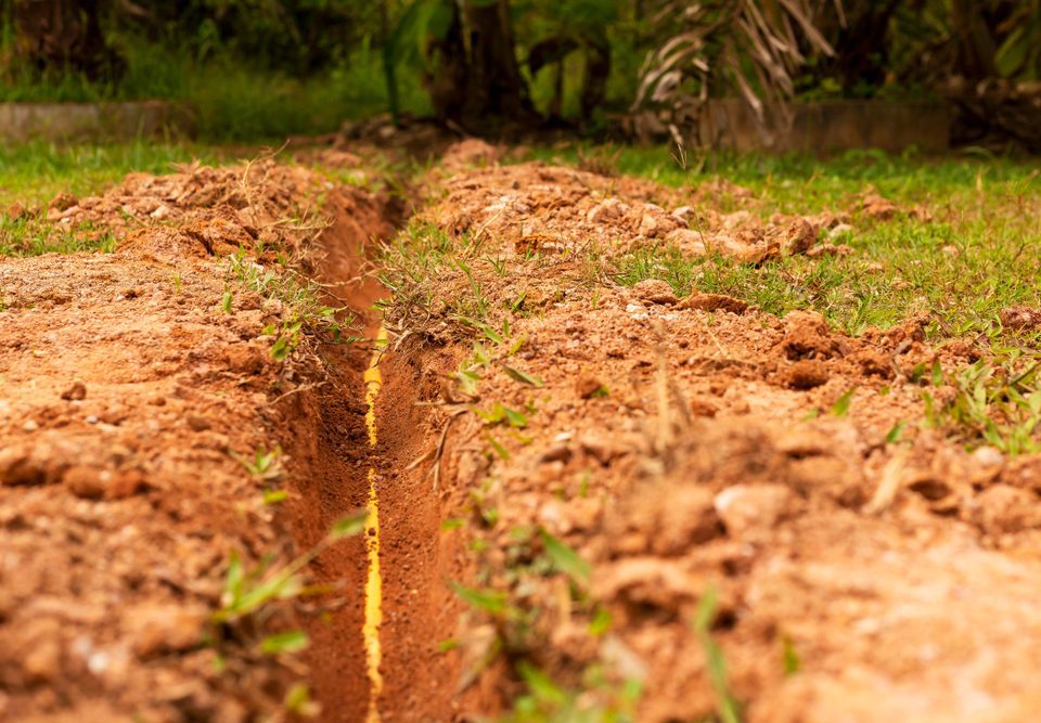 hole exposing residential service line